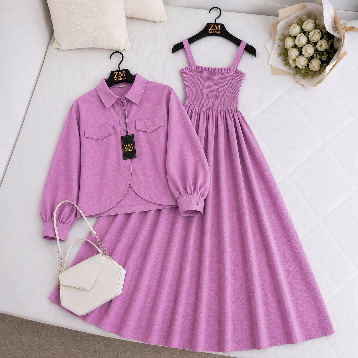 Purple shirt and dress set with a handbag on a white surface, featuring the brand 'ZM'.