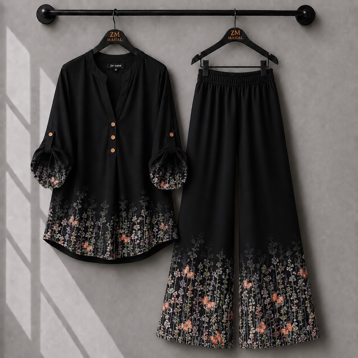 Black butterfly floral printed co-ord set with stylish shirt and wide-leg trousers.