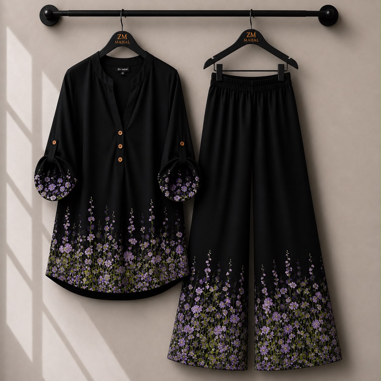 Elegant black co-ord set with lavender floral border print and wide-leg pants.